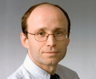 Dr. Klaus J.  Busam